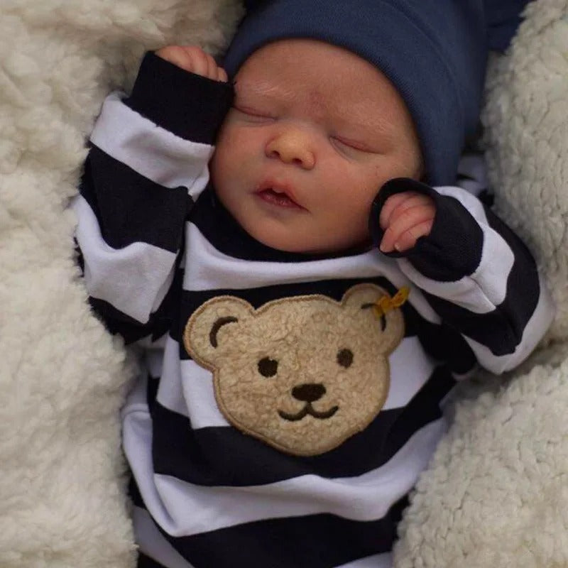 Simulated baby rebirth doll with visible 3D skin veins and blood streaks